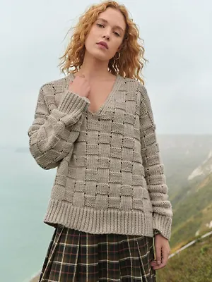 Вязаный джемпер Neutral Mole с V-образным вырезом и вафельной вязкой, выполненный из шерсти.